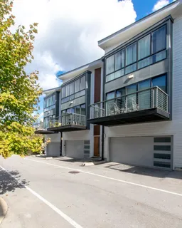 a front view of a house with a garage