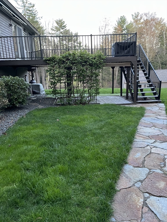 1260 Westhampton Road Northampton, MA 01062 - Photo 16 of 42 a view of a deck and patio with a yard