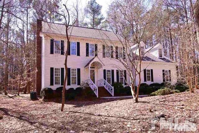 805 Thatcher Way Raleigh, NC 27615 - Photo 1 of 25 a front view of a house with a yard covered in snow