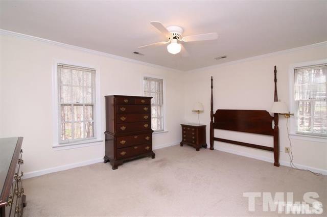 805 Thatcher Way Raleigh, NC 27615 - Photo 11 of 25 a living room with furniture and dresser
