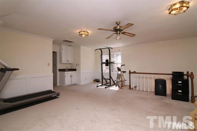 805 Thatcher Way Raleigh, NC 27615 - Photo 19 of 25 a view of a room with gym equipment