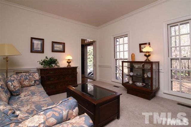 805 Thatcher Way Raleigh, NC 27615 - Photo 4 of 25 a living room with furniture and wooden floor