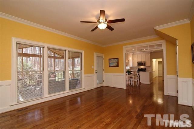 805 Thatcher Way Raleigh, NC 27615 - Photo 7 of 25 a view of a livingroom with wooden floor and a ceiling fan
