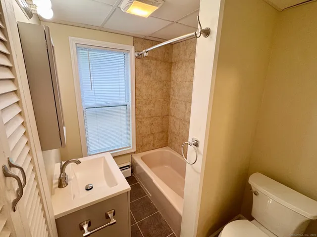 a bathroom with a sink and a tub