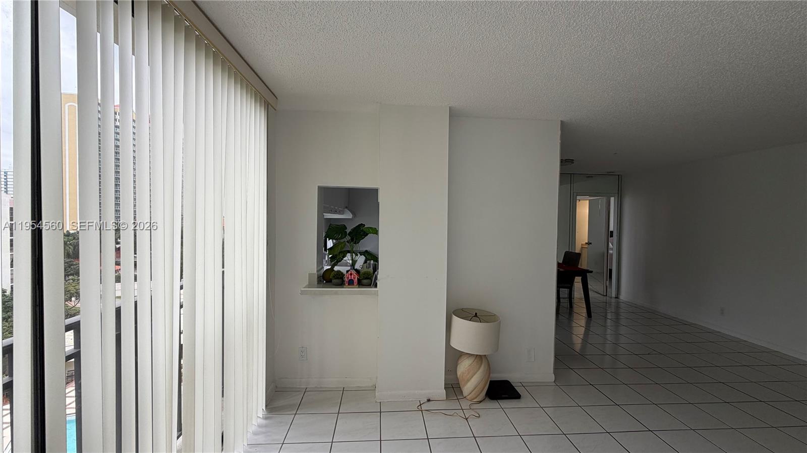 17011 North Bay Road, Unit 912 Sunny Isles Beach, FL 33160 - Photo 18 of 43 a view of an entryway with wooden floor