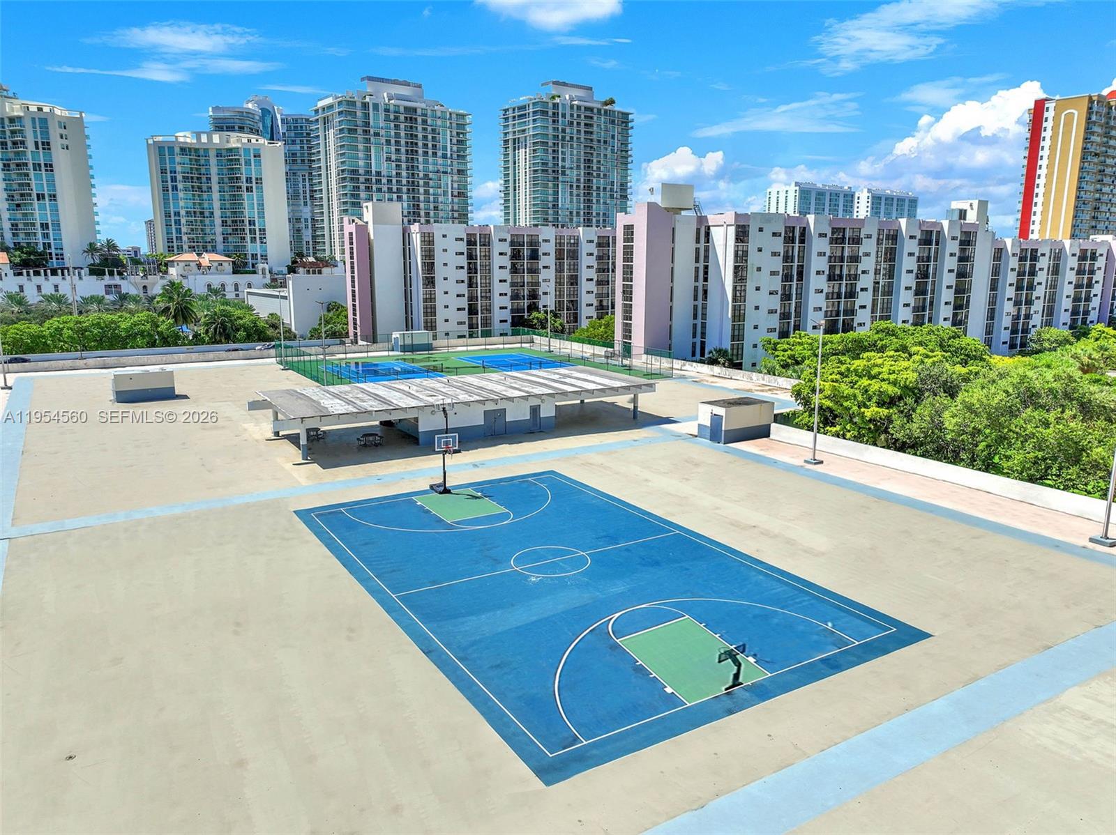17011 North Bay Road, Unit 912 Sunny Isles Beach, FL 33160 - Photo 33 of 43 a view of a tennis court