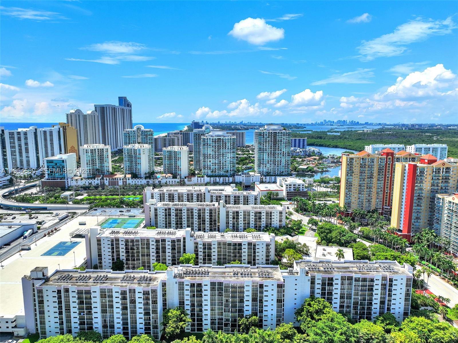17011 North Bay Road, Unit 912 Sunny Isles Beach, FL 33160 - Photo 42 of 43 a city view with tall buildings