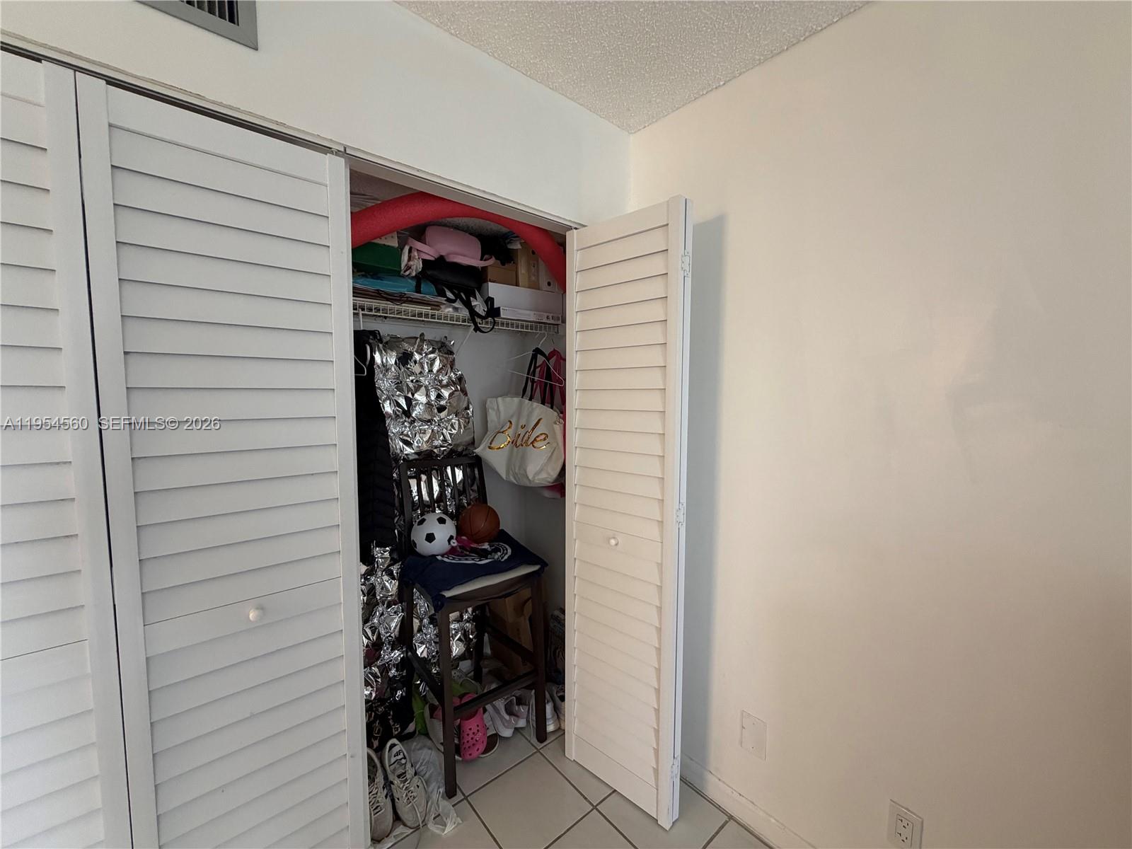 17011 North Bay Road, Unit 912 Sunny Isles Beach, FL 33160 - Photo 8 of 43 a view of a street with storage