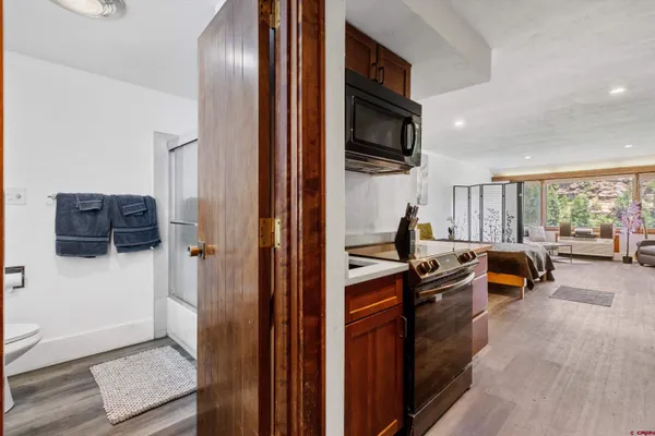 a view of living room with furniture and flat screen tv
