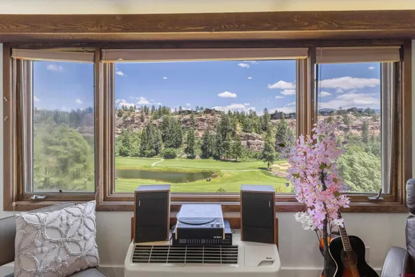 a view of an outdoor dining space with furniture