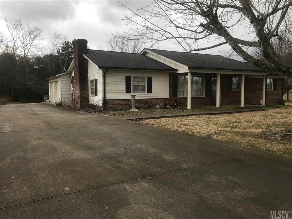 316 York Road Stony Point, NC 28678 - Photo 1 of 15 a front view of a house with yard