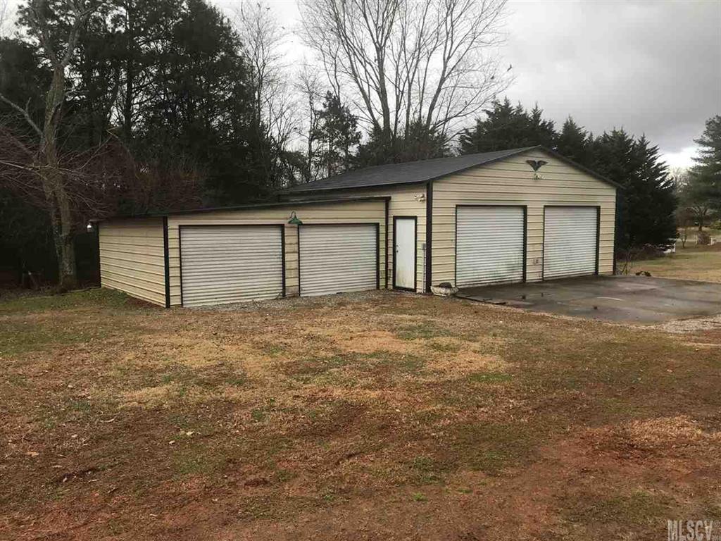 316 York Road Stony Point, NC 28678 - Photo 2 of 15 a front view of a house with a yard