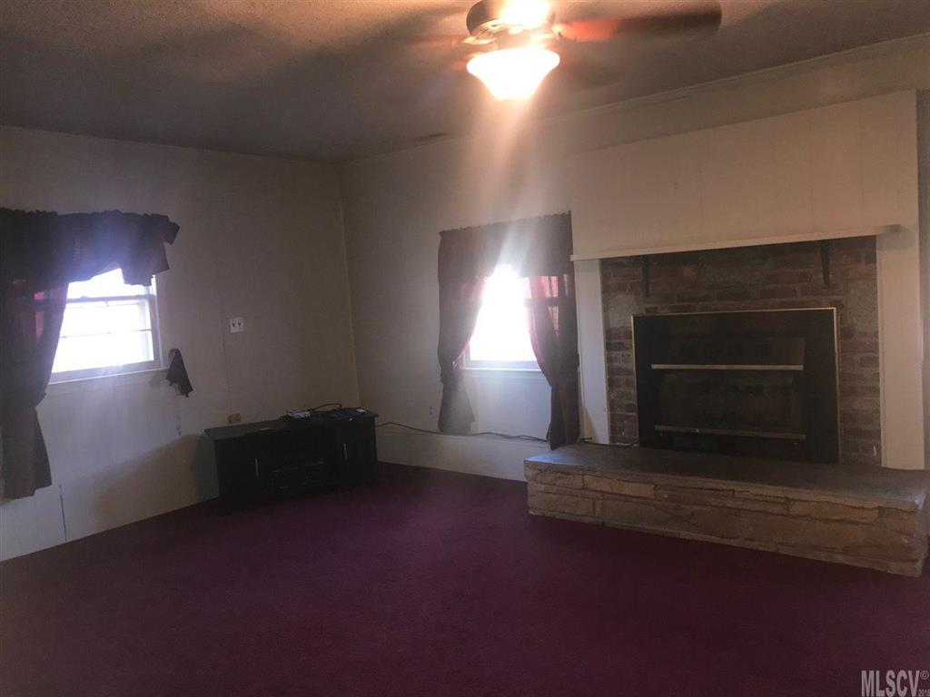 316 York Road Stony Point, NC 28678 - Photo 15 of 15 a living room with a fireplace