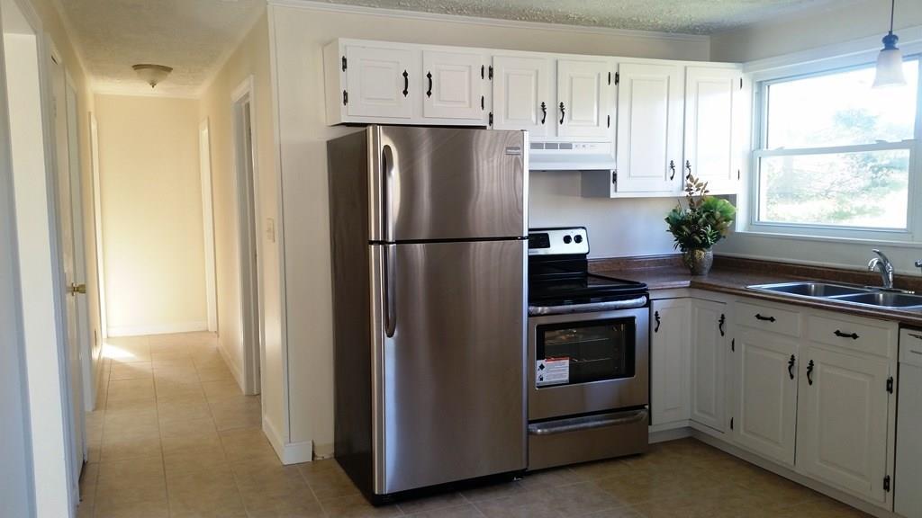 214 Chute Road Windham, ME 04062 - Photo 10 of 21 Kitchen and hallway to bedrooms