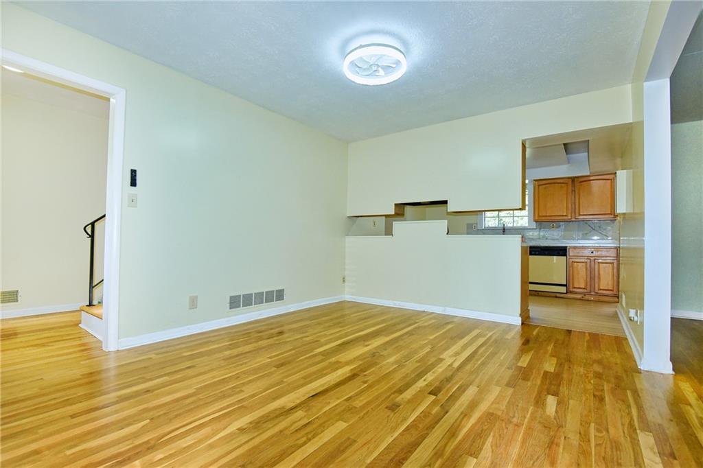 6418 Maddox Road Morrow, GA 30260 - Photo 11 of 30 a view of a room with wooden floor