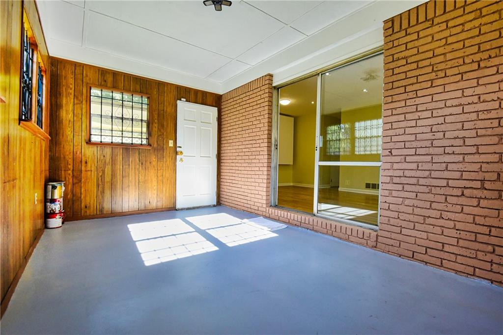 6418 Maddox Road Morrow, GA 30260 - Photo 26 of 30 a view of an empty room with glass door