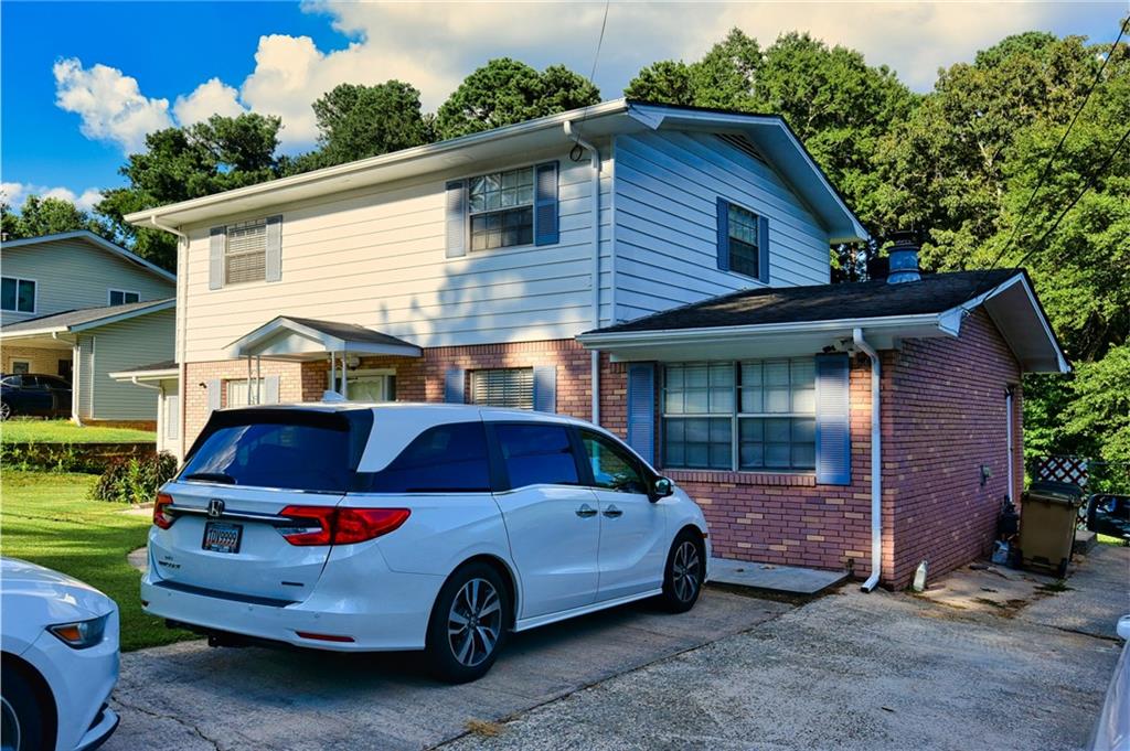 6418 Maddox Road Morrow, GA 30260 - Photo 3 of 30 a car parked in front of a house