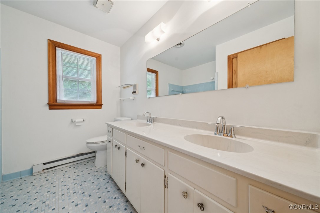8410 Beach Road Chesterfield, VA 23838 - Photo 14 of 22 a bathroom with a double vanity sink mirror and double
