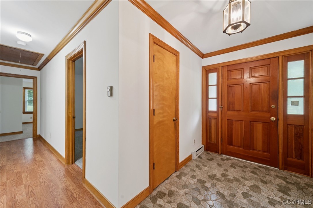 8410 Beach Road Chesterfield, VA 23838 - Photo 5 of 22 a view of a hallway with wooden floor and closet