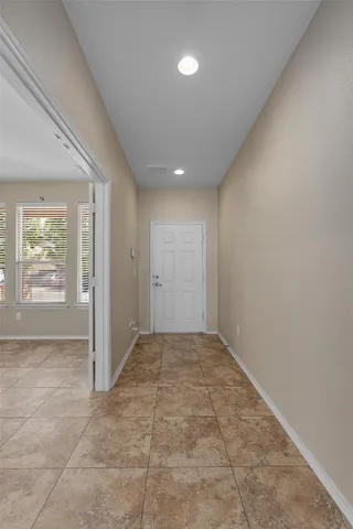 en empty room with windows