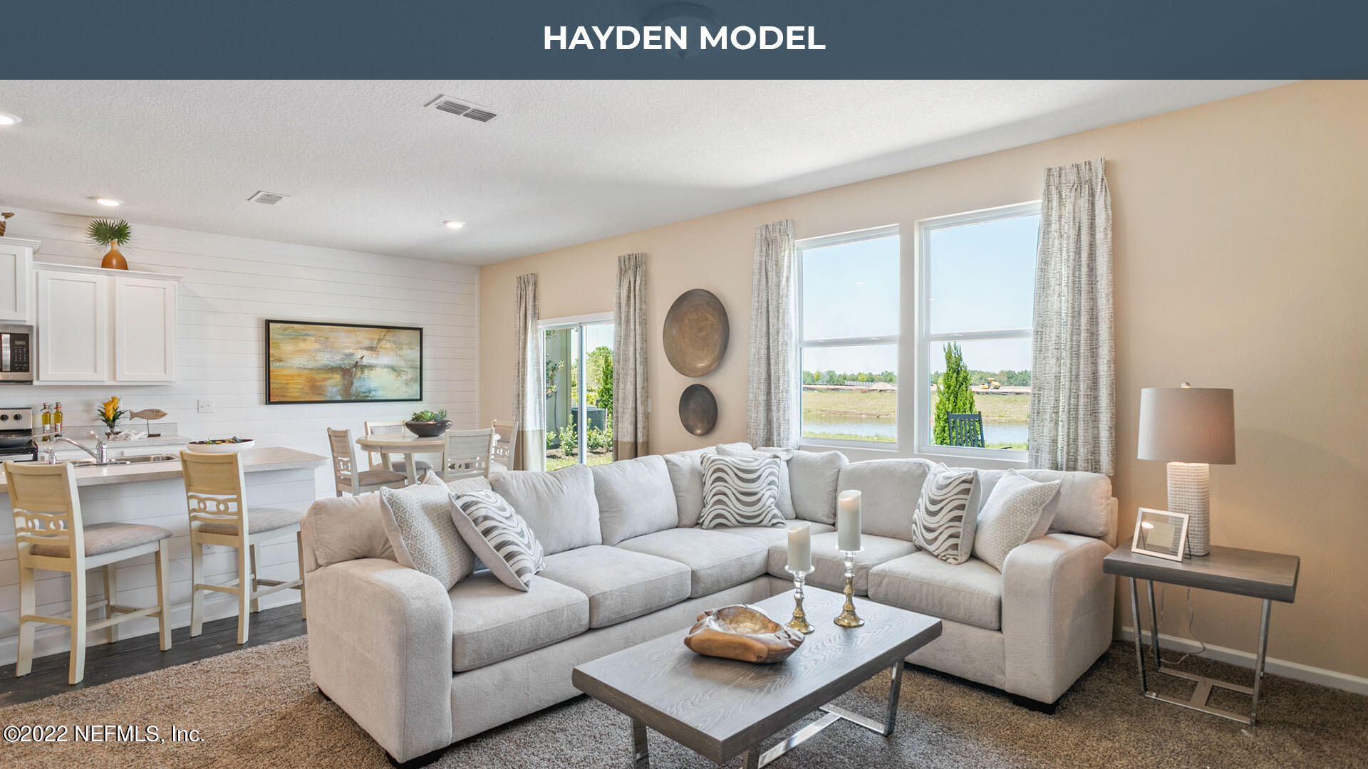 187 Encanto Way Street St. Augustine, FL 32084 - Photo 9 of 47 a living room with furniture and a large window