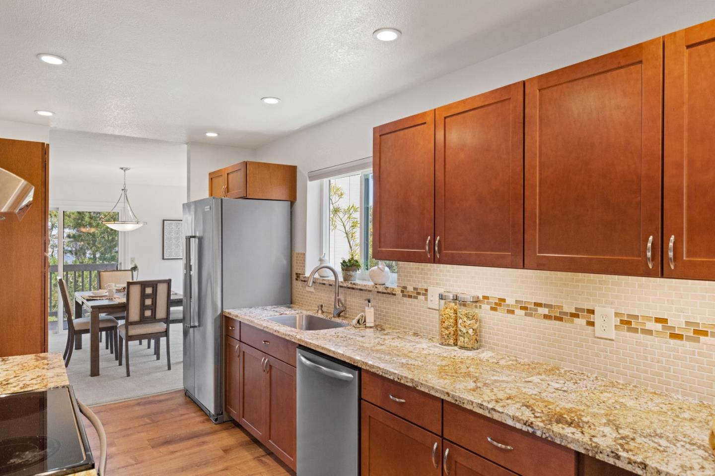 43 Shepherd's Knoll Pebble Beach, CA 93953 - Photo 13 of 34 a bathroom with a granite countertop sink and a large mirror