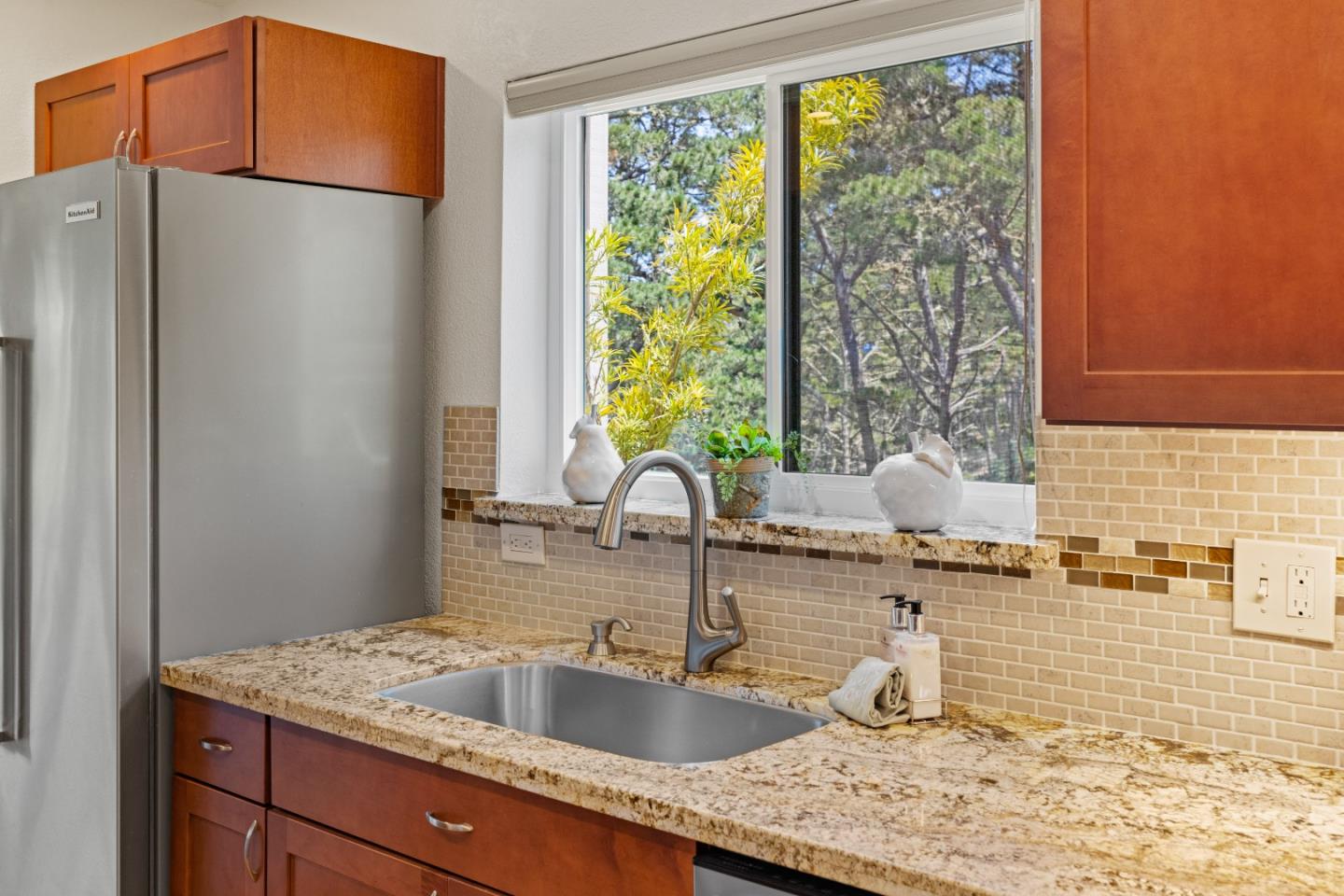 43 Shepherd's Knoll Pebble Beach, CA 93953 - Photo 17 of 34 a kitchen with sink a refrigerator and a sink