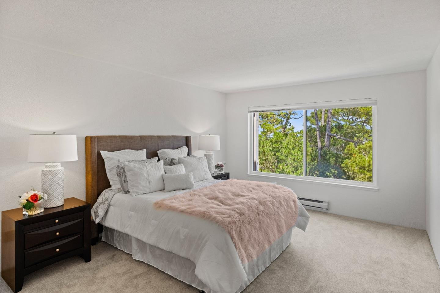 43 Shepherd's Knoll Pebble Beach, CA 93953 - Photo 20 of 34 a bedroom with a bed and a window