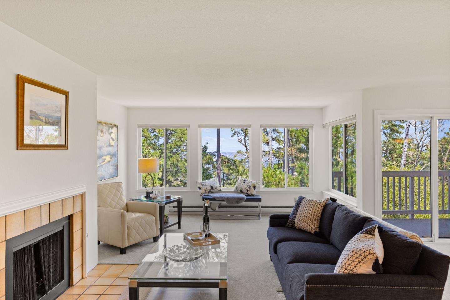 43 Shepherd's Knoll Pebble Beach, CA 93953 - Photo 3 of 34 a living room with furniture and a fireplace