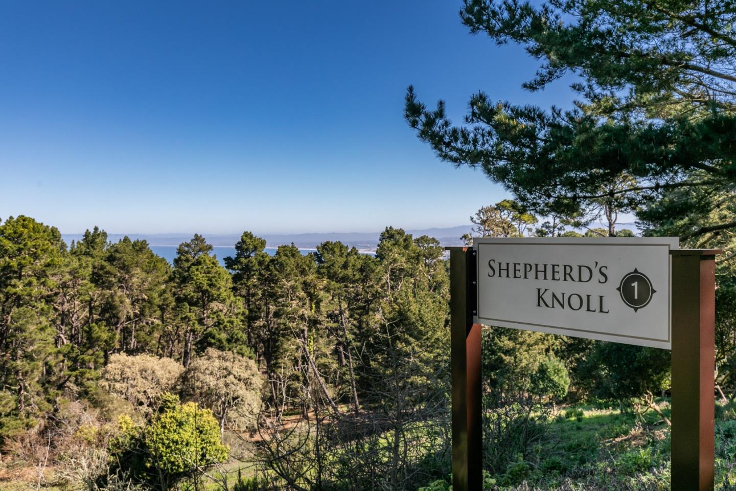 43 Shepherd's Knoll Pebble Beach, CA 93953 - Photo 34 of 34 a street sign on a pole on a wall