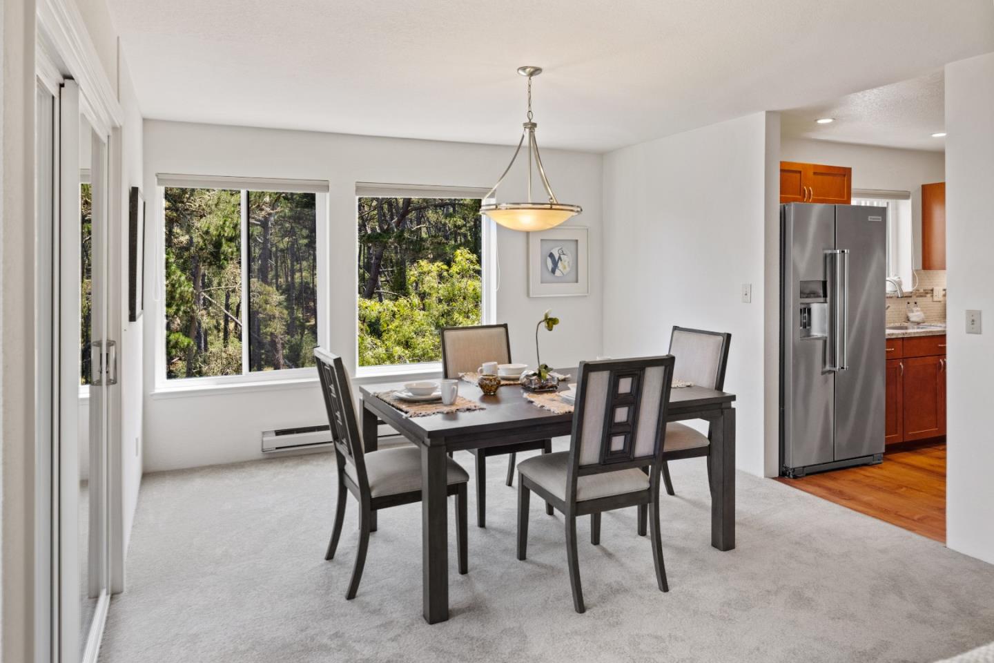 43 Shepherd's Knoll Pebble Beach, CA 93953 - Photo 10 of 34 a view of a dining room with a table and chairs