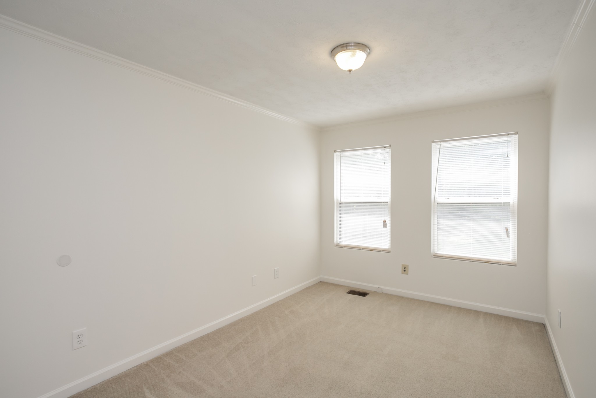 1720 Hanover Road, Unit B Nashville, TN 37216 - Photo 13 of 25 an empty room with a window