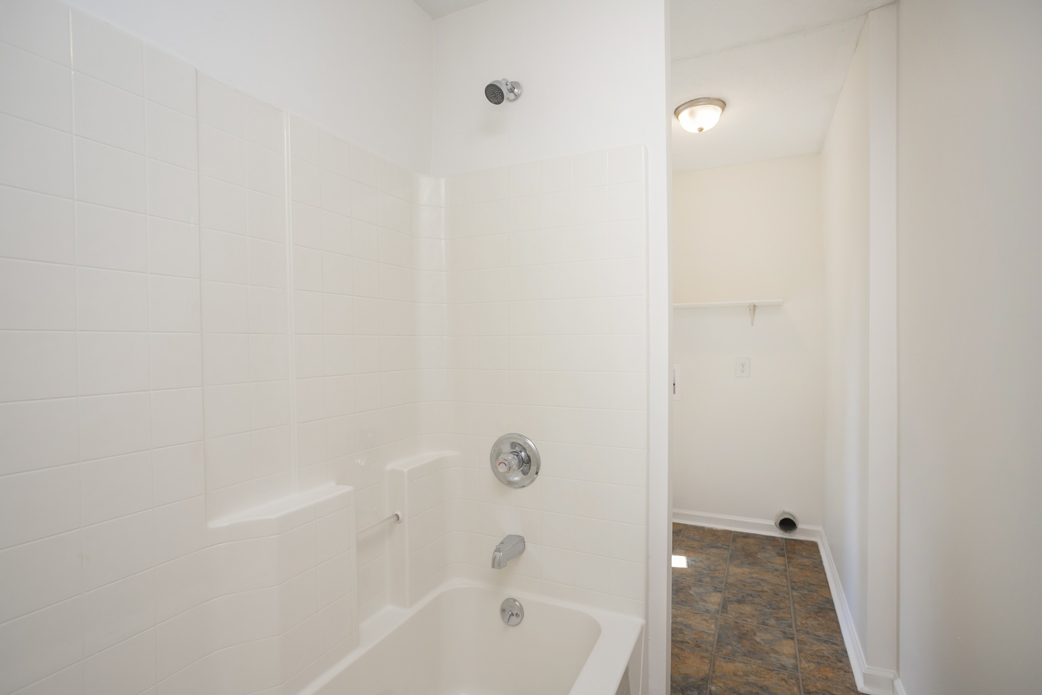 1720 Hanover Road, Unit B Nashville, TN 37216 - Photo 23 of 25 a bathroom with a bathtub