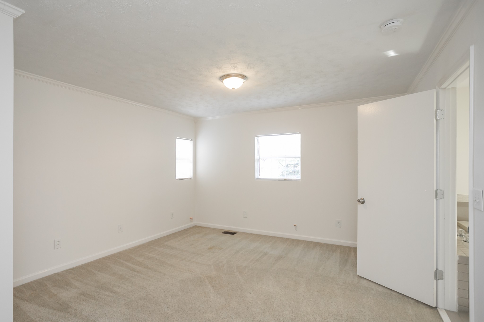 1720 Hanover Road, Unit B Nashville, TN 37216 - Photo 6 of 25 an empty room with a empty space and windows