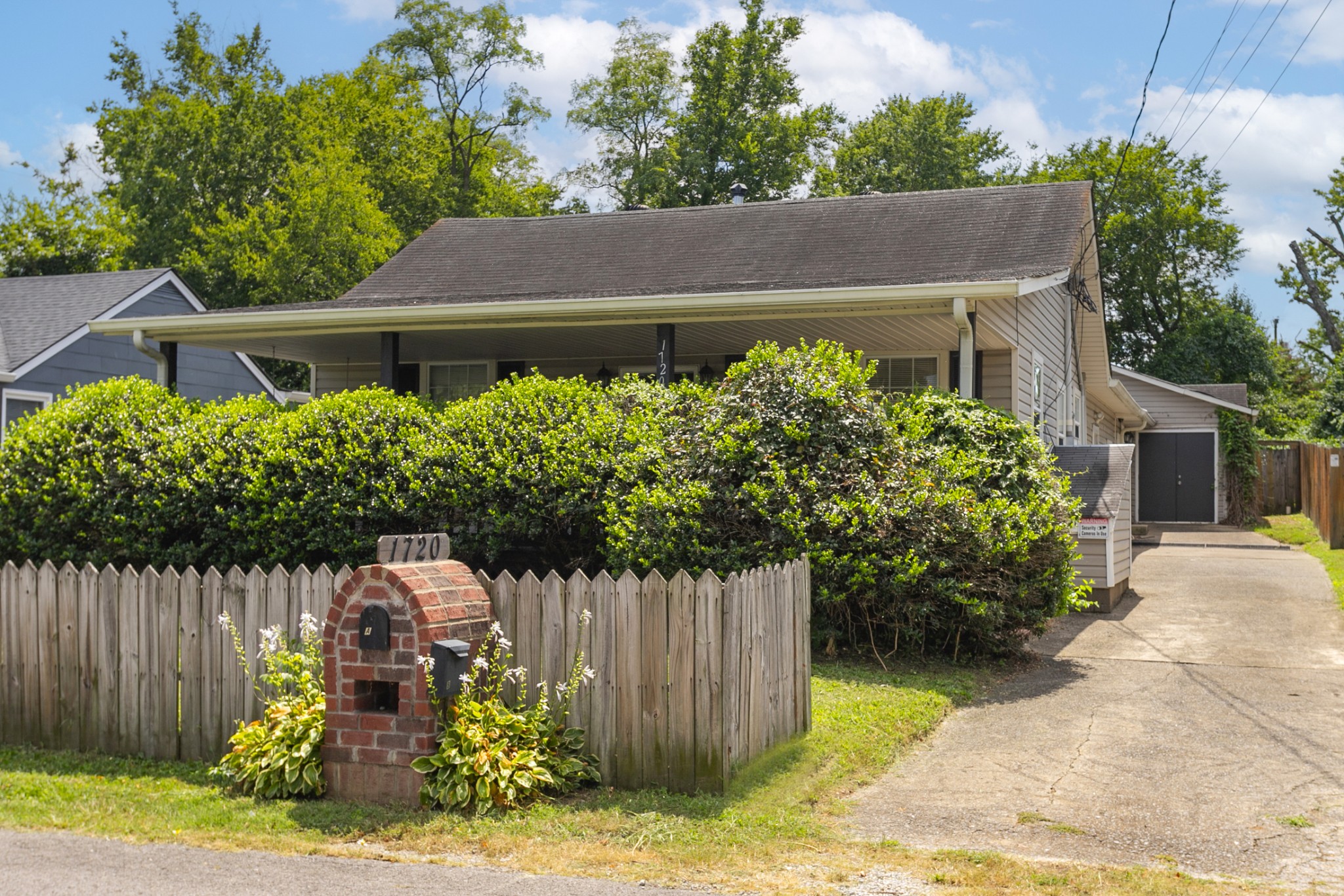 1720 Hanover Road, Unit B Nashville, TN 37216 - Photo 9 of 25 a front view of house with a garden