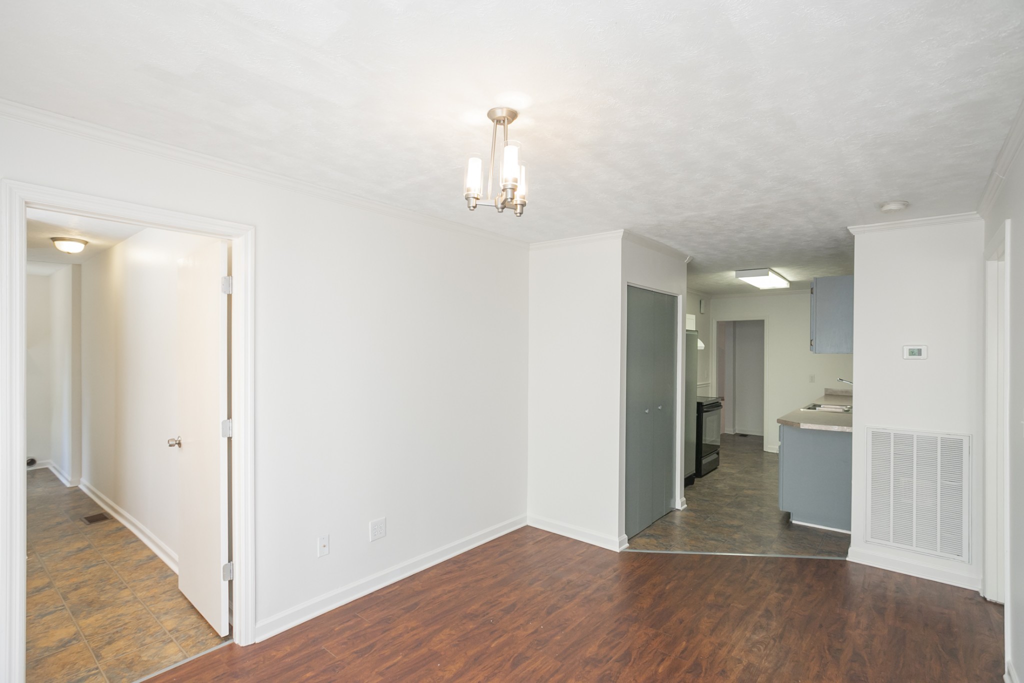 1720 Hanover Road, Unit B Nashville, TN 37216 - Photo 10 of 25 a view of a hallway with wooden floor and a bathroom