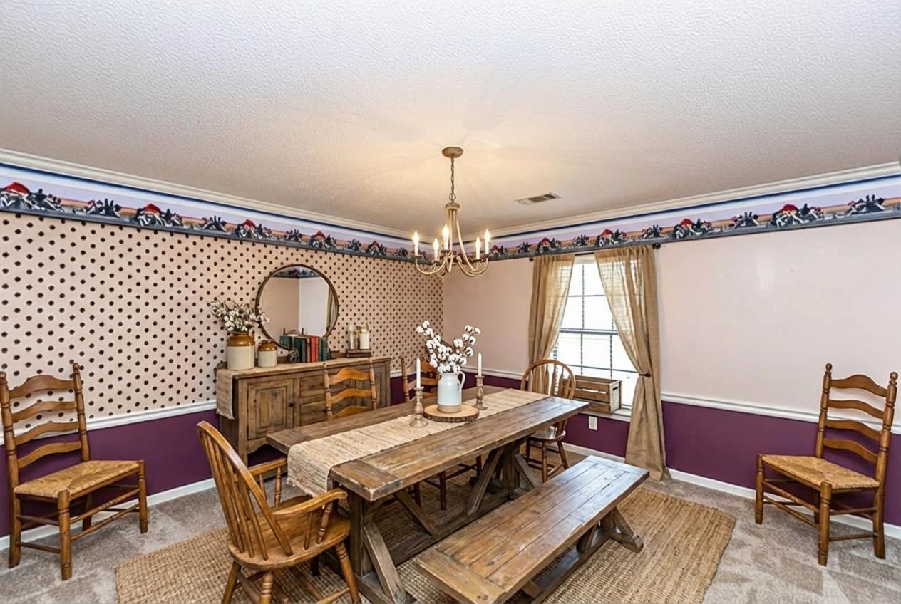 643 Fore Lane Mason, TN 38049 - Photo 14 of 40 a view of a dining room with furniture window and wooden floor