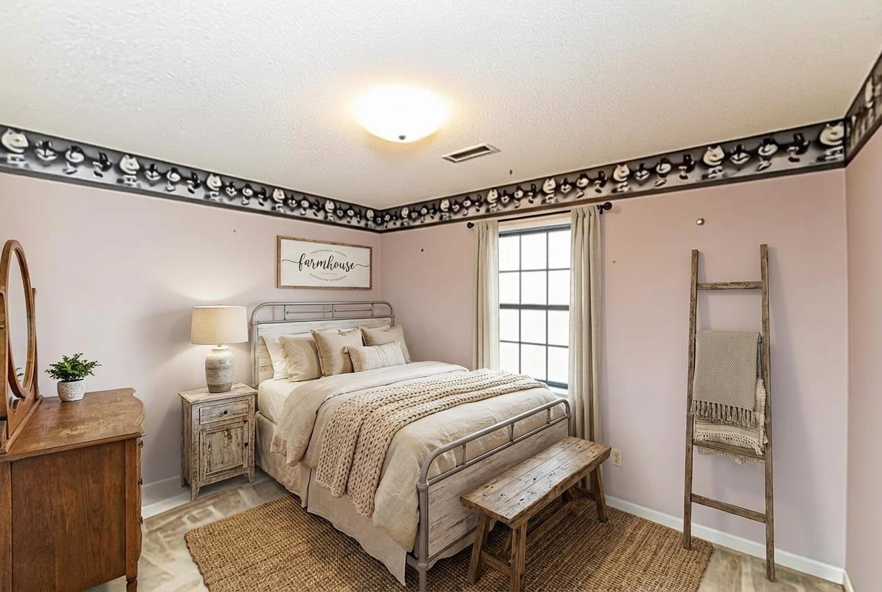 643 Fore Lane Mason, TN 38049 - Photo 17 of 40 a bedroom with a bed and a window