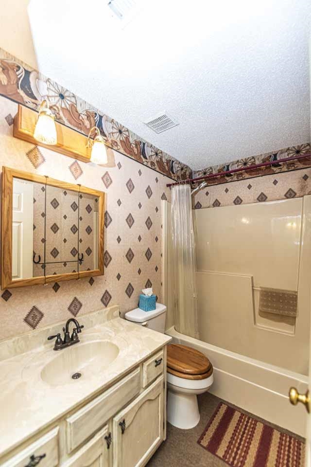 643 Fore Lane Mason, TN 38049 - Photo 18 of 40 a bathroom with a sink toilet and shower