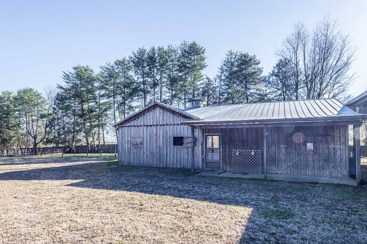 643 Fore Lane Mason, TN 38049 - Photo 28 of 40 a view of a house with a yard