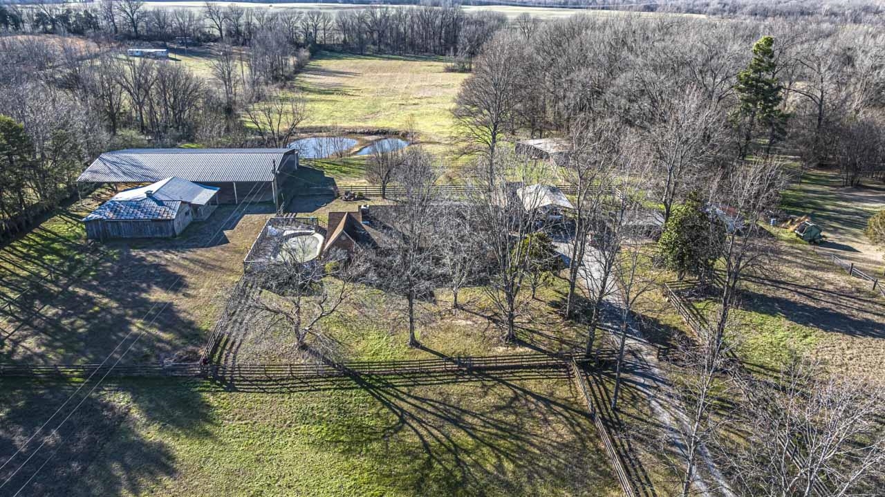 643 Fore Lane Mason, TN 38049 - Photo 40 of 40 a view of swimming pool from a lake view