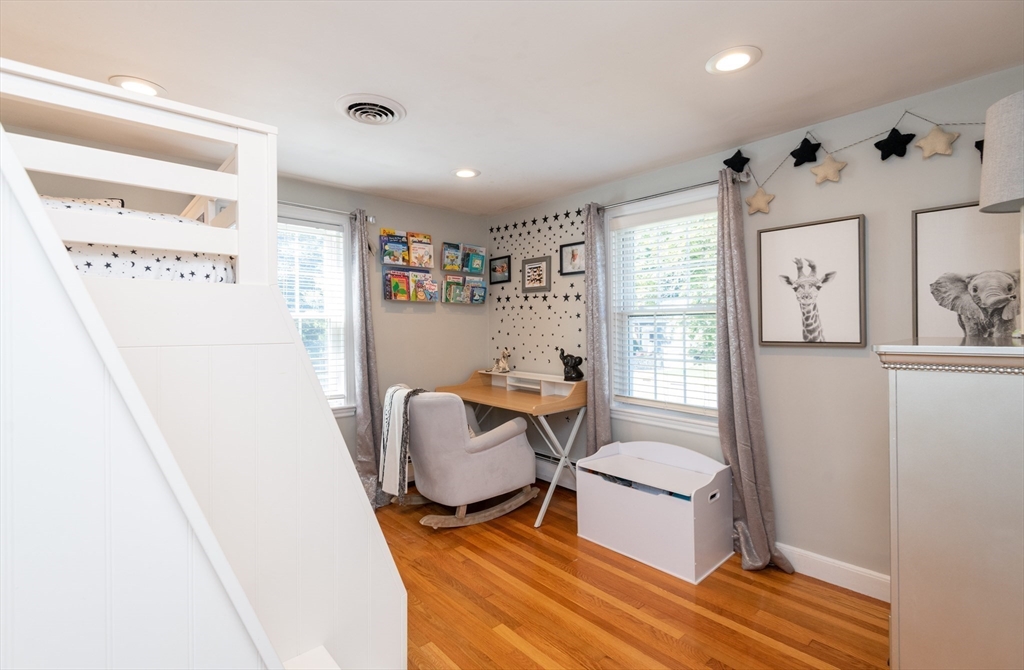 19 Longbow Road Lynnfield, MA 01940 - Photo 25 of 41 a living room with a couch and a window