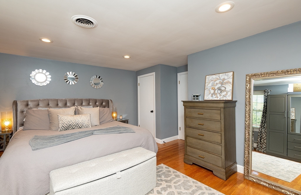 19 Longbow Road Lynnfield, MA 01940 - Photo 28 of 41 a bedroom with a bed and walk in closet