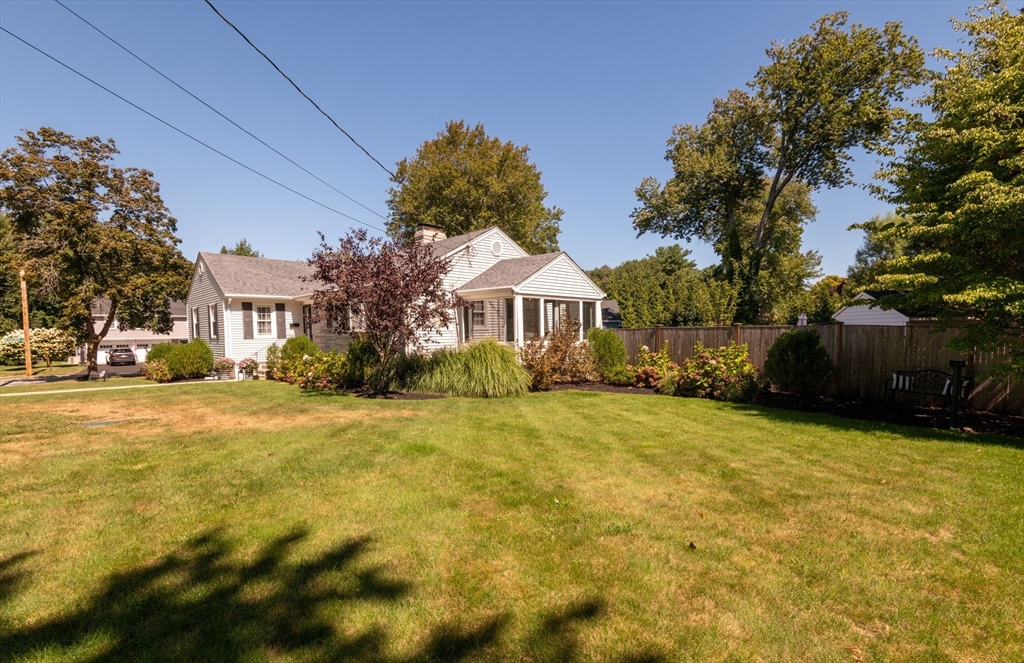 19 Longbow Road Lynnfield, MA 01940 - Photo 3 of 41 a front view of house with yard and trees