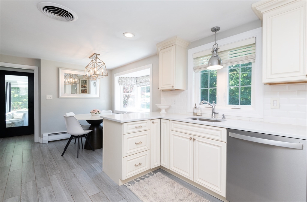 19 Longbow Road Lynnfield, MA 01940 - Photo 10 of 41 a kitchen with a sink cabinets and window