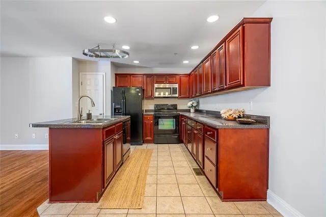 a view of an empty room and wooden floor