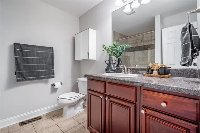 a bathroom with a shower and a bath tub