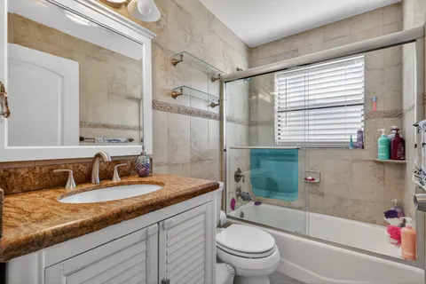 $569,900 | 5875 Sun Pointe Circle, Boynton Beach, FL 33437