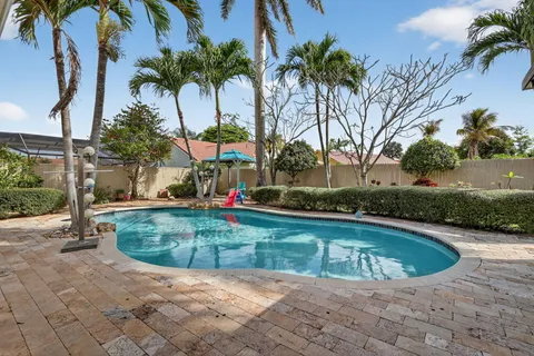 $569,900 | 5875 Sun Pointe Circle, Boynton Beach, FL 33437