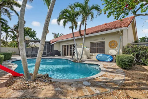$569,900 | 5875 Sun Pointe Circle, Boynton Beach, FL 33437